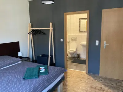 Ein Bett oder Betten in einem Zimmer der Unterkunft Pension Boulevard