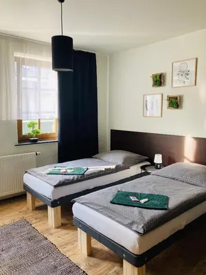 Ein Bett oder Betten in einem Zimmer der Unterkunft Pension Boulevard