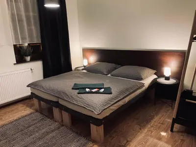 Ein Bett oder Betten in einem Zimmer der Unterkunft Pension Boulevard