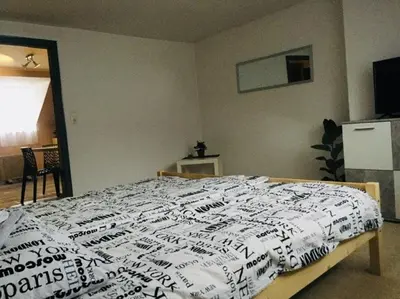Ein Bett oder Betten in einem Zimmer der Unterkunft Firmen-Apartments Boulevard