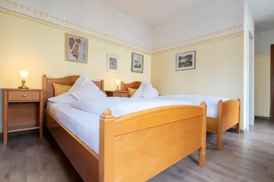 Ein Bett oder Betten in einem Zimmer der Unterkunft Sperber Bräu - 3-Sterne-Superior Hotel mit Gasthof und eigener Brauerei - kein Ruhetag
