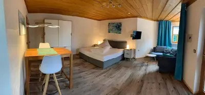 Ein Bett oder Betten in einem Zimmer der Unterkunft Landhaus Am Forst