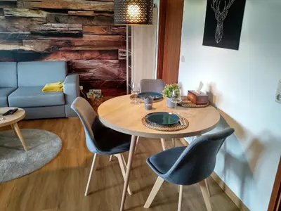 Ein Sitzbereich in der Unterkunft Ferienwohnung Fichtelzauber