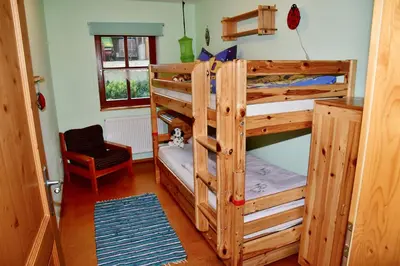 Ein Bett oder Betten in einem Zimmer der Unterkunft Ferienwohnung Burgerhof
