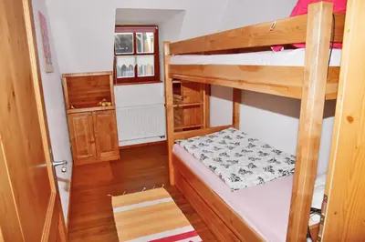 Ein Bett oder Betten in einem Zimmer der Unterkunft Ferienwohnung Burgerhof