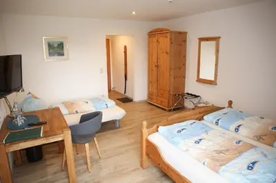 Ein Bett oder Betten in einem Zimmer der Unterkunft Gasthof Schloßbräu Lintach