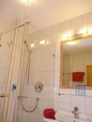 Ein Badezimmer in der Unterkunft Gasthof Schloßbräu Lintach