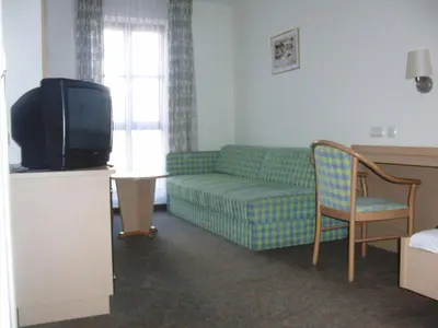 Ein Sitzbereich in der Unterkunft Hotel Angerer
