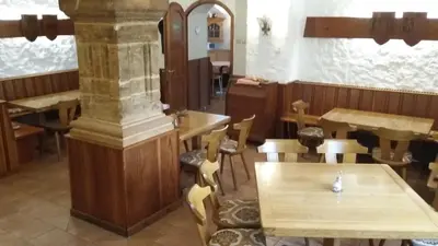 Ein Restaurant oder anderes Speiselokal in der Unterkunft Hotel Angerer