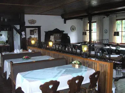 Ein Restaurant oder anderes Speiselokal in der Unterkunft Hotel Buchberg