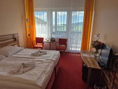 Ein Bett oder Betten in einem Zimmer der Unterkunft Panorama Hotel Oberwiesenthal