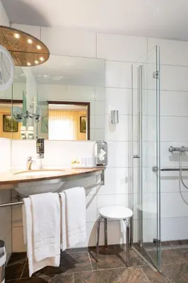 Ein Badezimmer in der Unterkunft Hotel An der Eiche