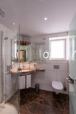 Ein Badezimmer in der Unterkunft Hotel An der Eiche