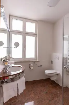 Ein Badezimmer in der Unterkunft Hotel An der Eiche