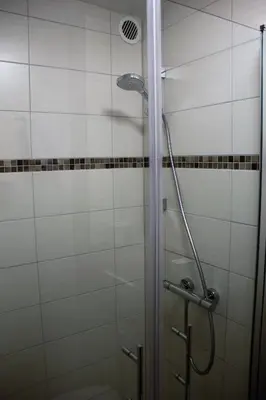 Ein Badezimmer in der Unterkunft Hotel Munzert