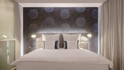 Ein Bett oder Betten in einem Zimmer der Unterkunft Hotel Central