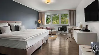 Ein Bett oder Betten in einem Zimmer der Unterkunft Hotel Central