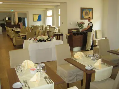 Ein Restaurant oder anderes Speiselokal in der Unterkunft Santé Royale Hotel- & Gesundheitsresort Bad Brambach