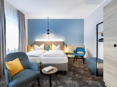 Ein Bett oder Betten in einem Zimmer der Unterkunft Hotel Purucker