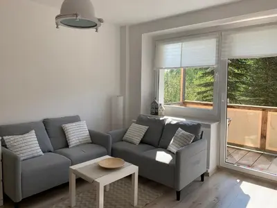 Ein Sitzbereich in der Unterkunft Moderne Ferienwohnung für 5 Gäste in Oberwiesenthal