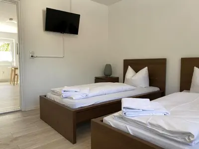 Ein Bett oder Betten in einem Zimmer der Unterkunft SAD150 - Moderne Monteurwohnungen in Schwandorf mit Balkon