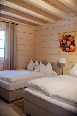 Ein Bett oder Betten in einem Zimmer der Unterkunft Chalet Bischofsmühle