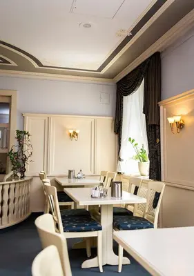 Ein Sitzbereich in der Unterkunft Hotel Burghof