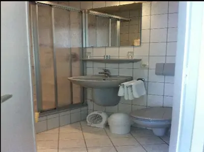 Ein Badezimmer in der Unterkunft Gästehaus Café Ruff