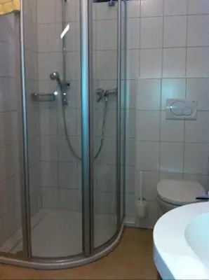 Ein Badezimmer in der Unterkunft Gästehaus Café Ruff