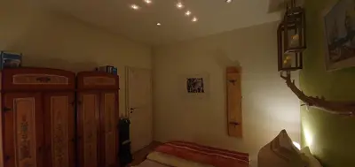 Ein Bett oder Betten in einem Zimmer der Unterkunft Enderlein´s Ferienwohnung