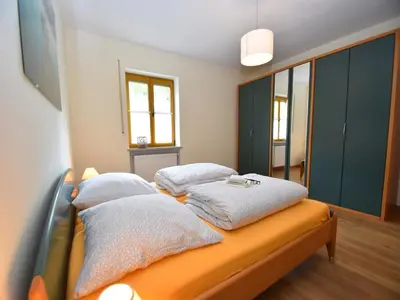 Ein Bett oder Betten in einem Zimmer der Unterkunft Apartment in Tannesberg mit Balkon