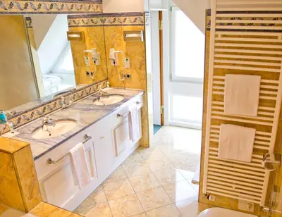Ein Badezimmer in der Unterkunft Hotel Kainsbacher Mühle