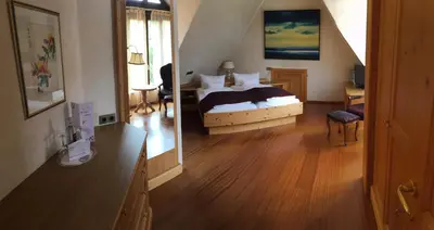 Ein Bett oder Betten in einem Zimmer der Unterkunft Hotel Kainsbacher Mühle