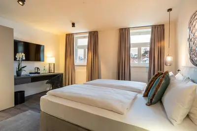 Ein Bett oder Betten in einem Zimmer der Unterkunft Hotel Weißes Ross