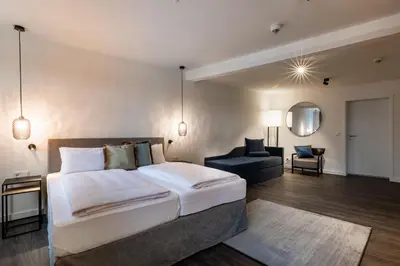 Ein Bett oder Betten in einem Zimmer der Unterkunft Hotel Weißes Ross
