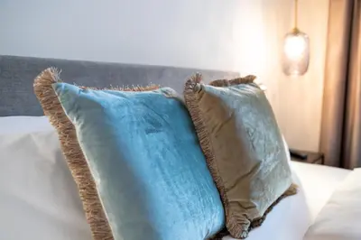 Ein Bett oder Betten in einem Zimmer der Unterkunft Hotel Weißes Ross