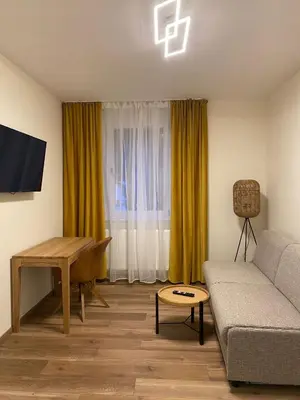 Ein Sitzbereich in der Unterkunft Hotel Hartl's Lindenmühle