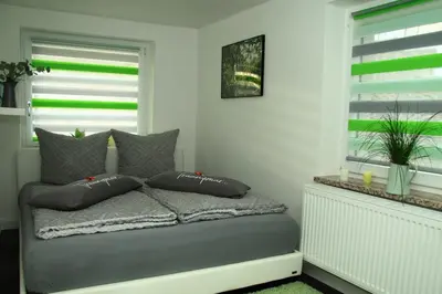 Ein Bett oder Betten in einem Zimmer der Unterkunft Ferienwohnung Haus Felix