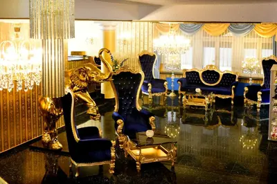 Ein Sitzbereich in der Unterkunft Hotel Alexandra