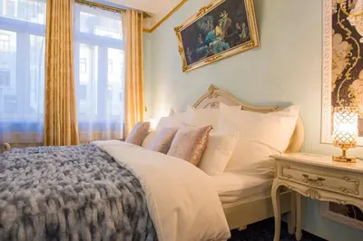 Ein Bett oder Betten in einem Zimmer der Unterkunft Hotel Alexandra