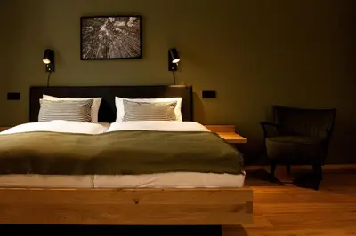Ein Bett oder Betten in einem Zimmer der Unterkunft Holzfellas Home