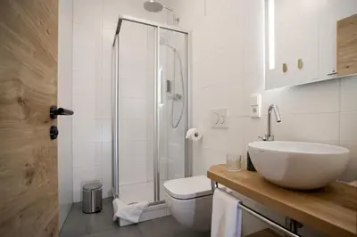 Ein Badezimmer in der Unterkunft Holzfellas Home