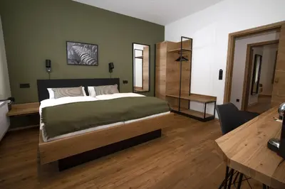 Ein Bett oder Betten in einem Zimmer der Unterkunft Holzfellas Home