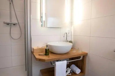 Ein Badezimmer in der Unterkunft Holzfellas Home