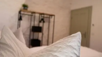 Ein Bett oder Betten in einem Zimmer der Unterkunft Mühlenhof Mähring