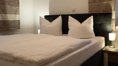 Ein Bett oder Betten in einem Zimmer der Unterkunft Mühlenhof Mähring