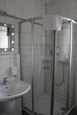 Ein Badezimmer in der Unterkunft Hotel Gasthof Fenzl