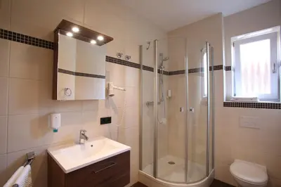 Ein Badezimmer in der Unterkunft Hotel Gasthof Fenzl