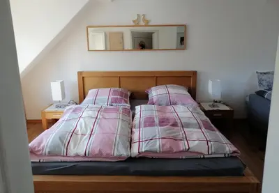 Ein Bett oder Betten in einem Zimmer der Unterkunft Ferienhaus Deko-Scheune