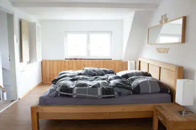 Ein Bett oder Betten in einem Zimmer der Unterkunft Ferienhaus Deko-Scheune